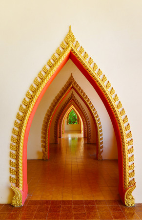 Arch pathway in pagoda Wat Tham SuaTiger Cave Temple Tha Moung Kanchanburi Thailandのeditorial素材