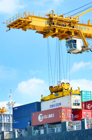 BANGKOK, September 6,2015: Port Authority of Thailand Klongtoey. The biggest port in Bangkok with loaded freight ship and cargo handling equipment on the side of Chao Phraya river. Bangkok,Thailand.のeditorial素材