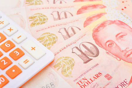 calculator and banknote singapore dollarの写真素材