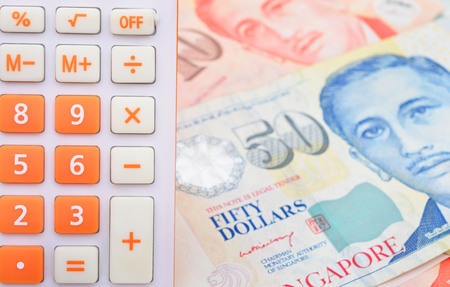 calculator and banknote singapore dollarの写真素材