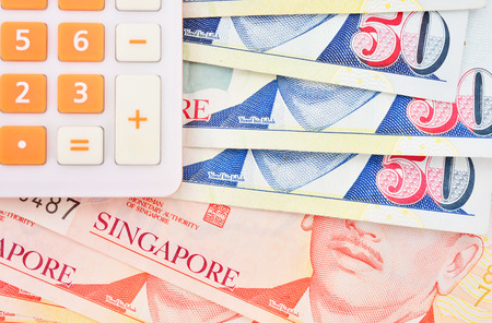 calculator and banknote singapore dollarの写真素材