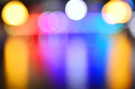 Blurred abstract background of Singapore downtown city lights skyline with colorful night.のeditorial素材