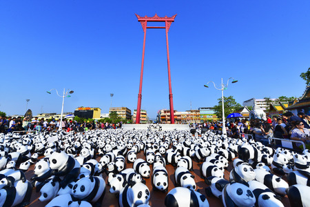 BANGKOK,THAILAND-MAR 13:1600 Pandas World Tour by WWF at Giant Swing, Bangkok on March 13, 2016. These paper marche pandas are made from recycled materials to represent 1600 pandas left in the wild.のeditorial素材