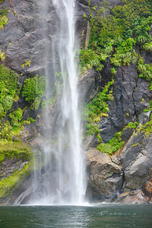 Waterfall of Milford Sound fiord, Fiordland National Park, New Zealand,wind and weatherのeditorial素材