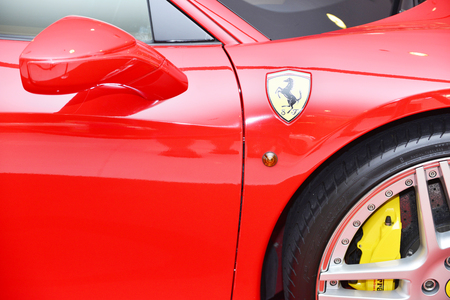 Bangkok,Thailand - JUNE1, 2016 : Logo of ferrari on the sport car.Italian week 2016 at Central World Shopping Mall. Ferrari S.P.A. is an Italian luxury sports car manufacturer. Founded by Enzo Ferrariのeditorial素材