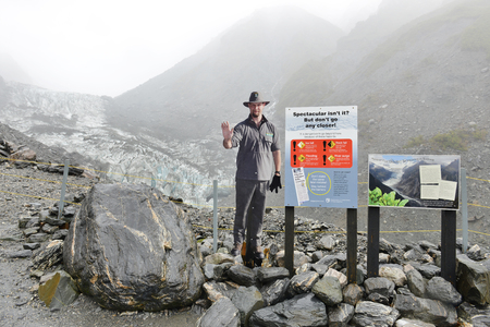 WEST COAST, NEW ZEALAND -NOV 15: Warning signs at Fox Glacier terminal face on November 15, 2014 in West Coast, NZ. Many tourists have died or been seriously injured after ignoring these signs.のeditorial素材