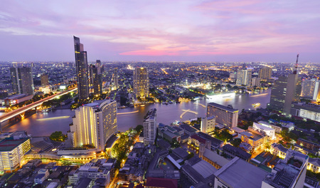 Bangkok city view point from rooftop bar, overlooking a magnificent cityscape blue sky and city light, Thailandの写真素材