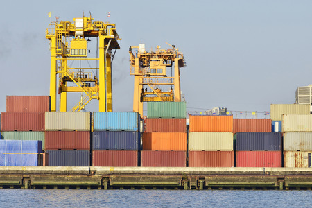 Container truck in port.transport and import-export commercial logistic ,shipping business industry.