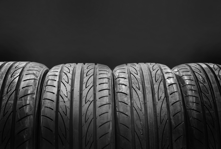 Car tires isolated on black backgroundの写真素材