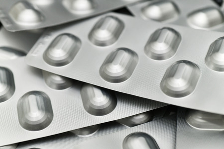 Medicine in aluminum blister pack backgroundの写真素材