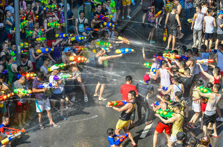 BANGKOK, THAILAND - APRIL 14, 2018: people happy and funny playing water in Songkran festival at Silom Road in Bangkok.のeditorial素材