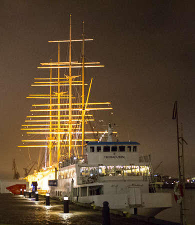 illuminated boats in harborのeditorial素材