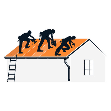 Team of roofers repairing the roof of a houseの写真素材
