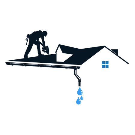 Worker repairing the roof of a house with guttersの写真素材