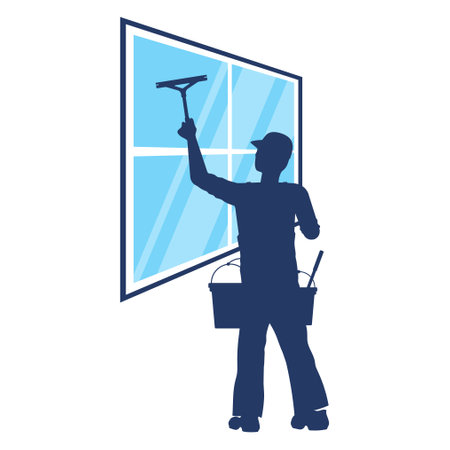 Washer man worker in uniform washing windowの写真素材