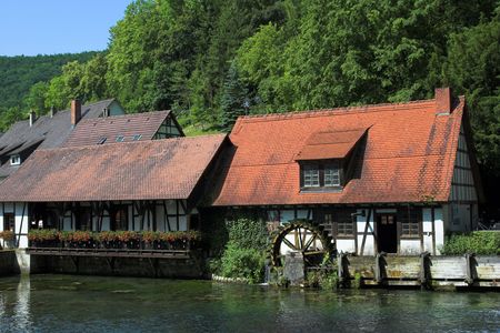 Historical hammer mill at spring Blautopf Blaubeuren, Germanyの写真素材