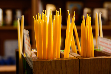 Candles are sold in the church.