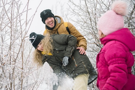 family spends time together in the winterの写真素材