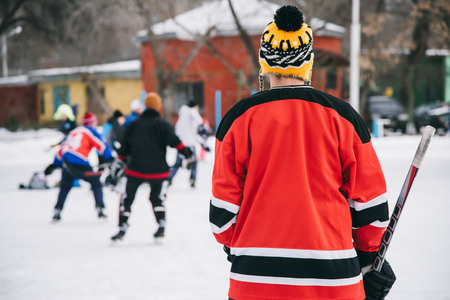 amateur hockey team plays on the iceの写真素材