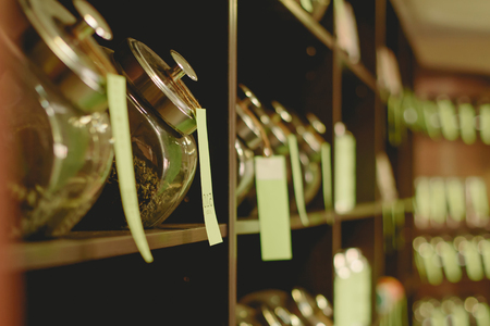 A row of cans with different teasの写真素材