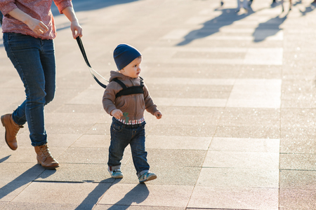 Mothers teach to walk on the roadの写真素材