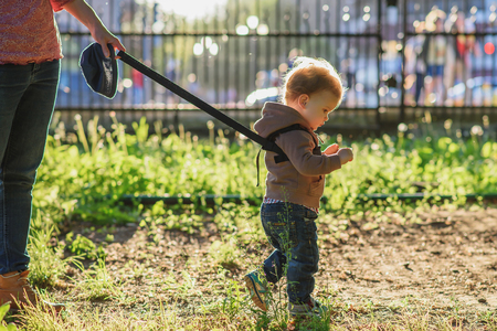 Mothers teach to walk on the roadの写真素材