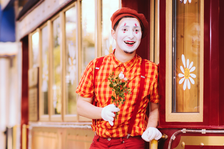 Clown on the street waiting to meet with his loverの写真素材