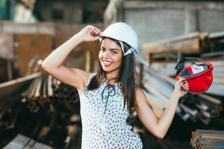 pretty girl model posing on metal stockの写真素材