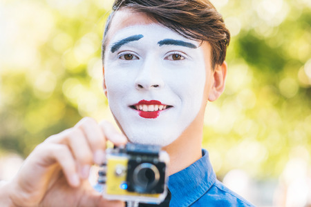 cute mime in shooting video on cameraの写真素材