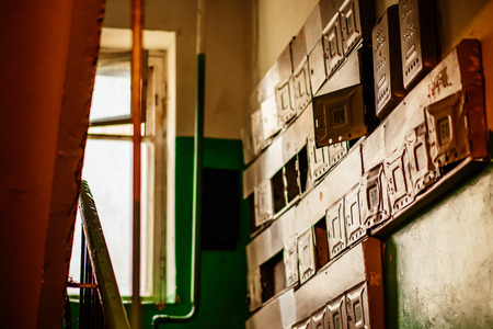 old broken metal mailboxes in the entrance to Russiaの写真素材