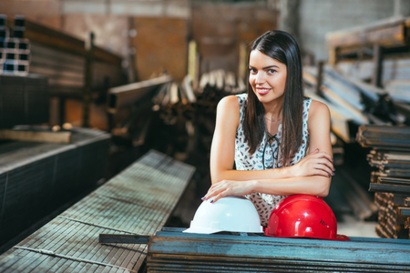 pretty girl model posing on metal stockの写真素材