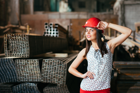 pretty girl model posing on metal stockの写真素材