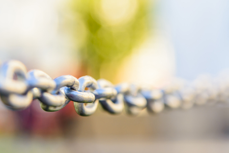 metal chain silver color closeup on the streetsの写真素材