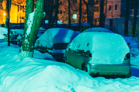 cars in the Parking lot are all in the snowの写真素材