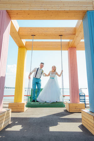 beautiful bride and groom pose for the cameraの写真素材
