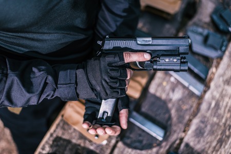 instructor in sport shooting to test your weapons in nature