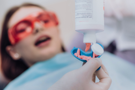 doctor performs the procedure for cleaning teethの写真素材