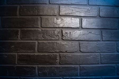 part of the brickwork of the house is painted blue