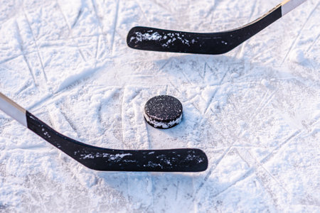close-up with the puck during the gameの写真素材