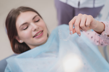 the doctor explains to the patient how he will treat her