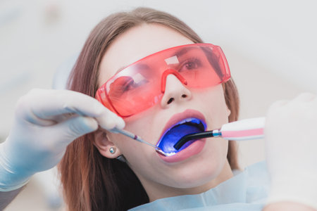 doctor examines the patient after brushing his teethの写真素材