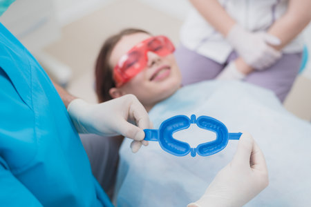 doctor performs the procedure for cleaning teethの写真素材