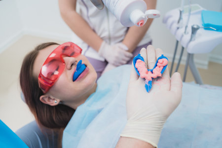 doctor performs the procedure for cleaning teethの写真素材