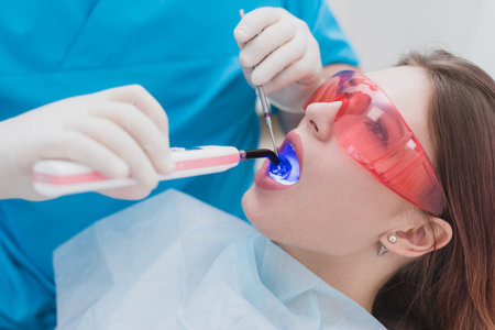 doctor examines the patient after brushing his teethの写真素材