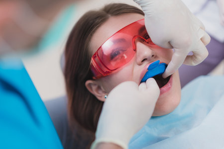 doctor performs the procedure for cleaning teethの写真素材