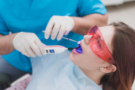 doctor examines the patient after brushing his teethの写真素材