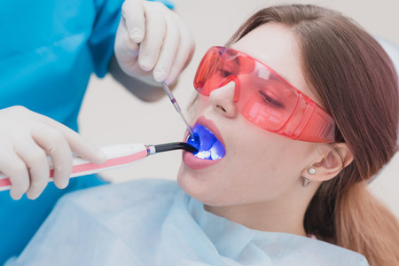 doctor examines the patient after brushing his teethの写真素材