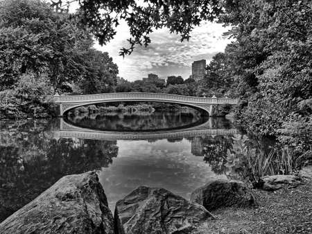 Bow bridge, Central Park, New York City in summer earlymorningの写真素材