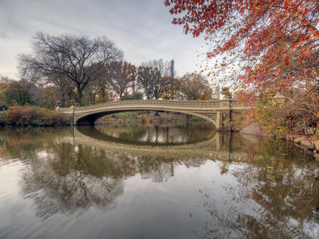 Bow bridge, Central Park, New York City in late autumn early in the morningの写真素材