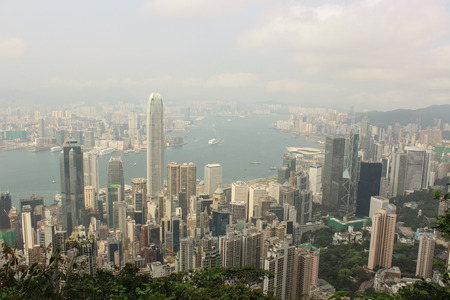 The view of Central, Kowloon and Victoria Harbour from Victoria Gap, near the top of Victoria Peak on April 2014 in Hong Kongのeditorial素材